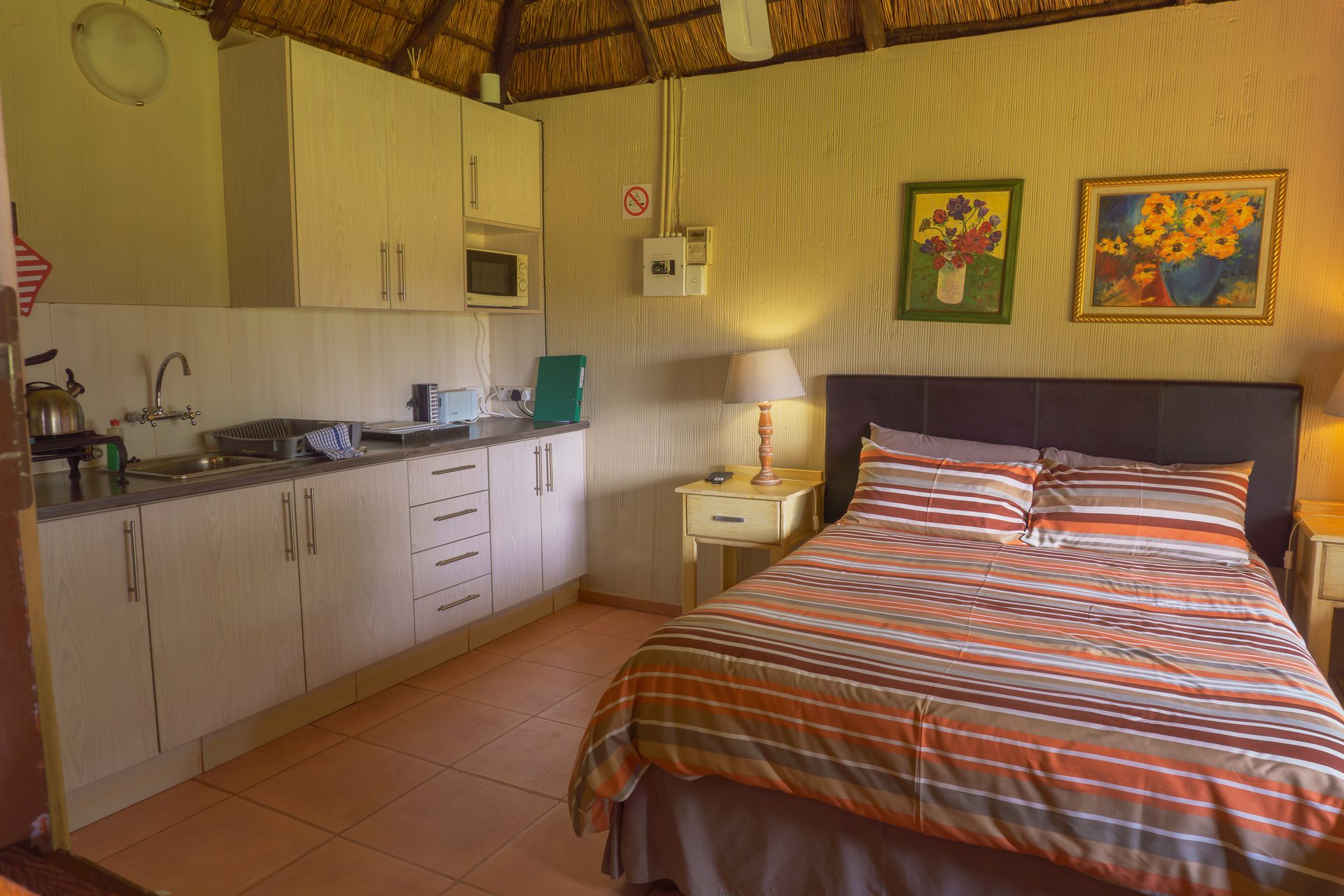 Bedroom in 4-sleeper family chalet at Gallery Inn Bela Bela